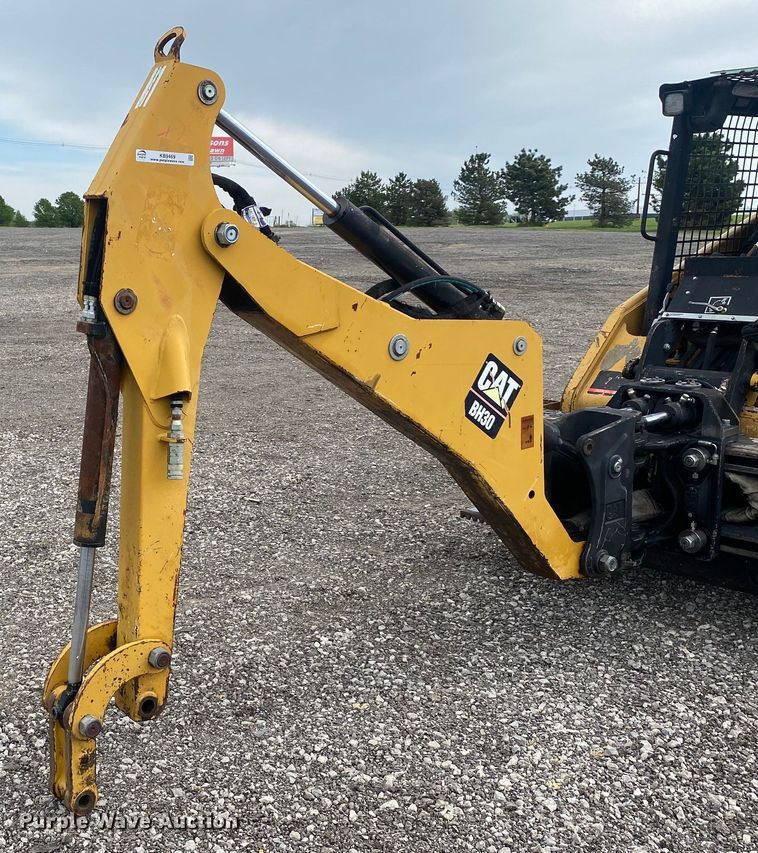 image for item KB9469 Caterpillar BH30  skid steer backhoe