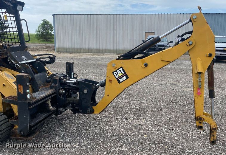 image for item KB9469 Caterpillar BH30  skid steer backhoe