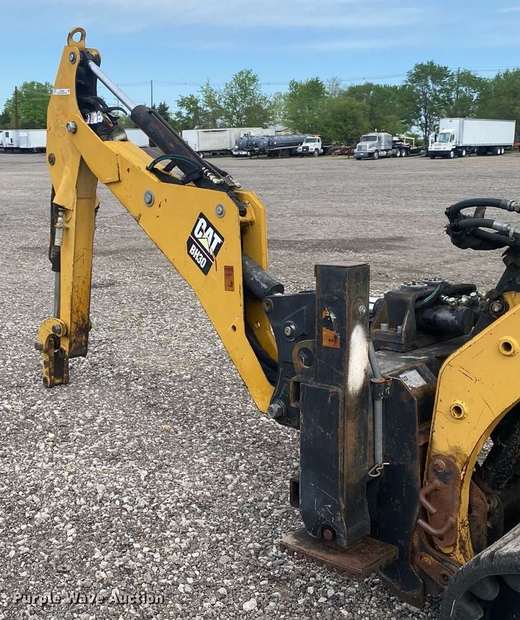 image for item KB9469 Caterpillar BH30  skid steer backhoe