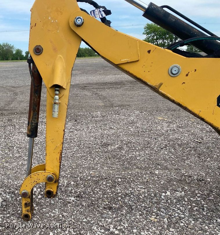 image for item KB9469 Caterpillar BH30  skid steer backhoe