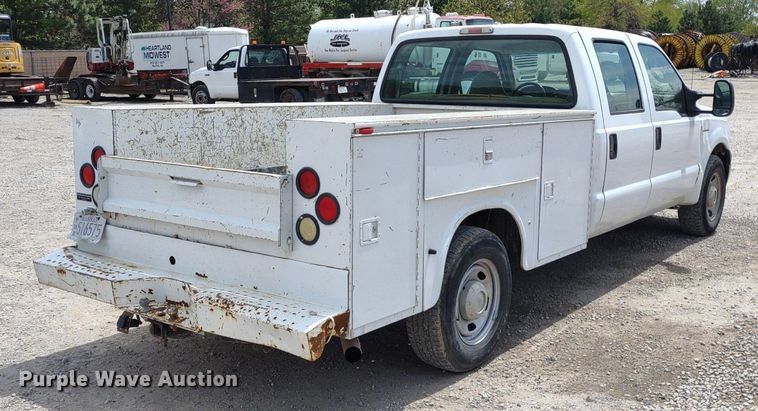 image for item LL9088 2006 Ford F350 Super Duty XL  Crew Cab utility bed pickup truck
