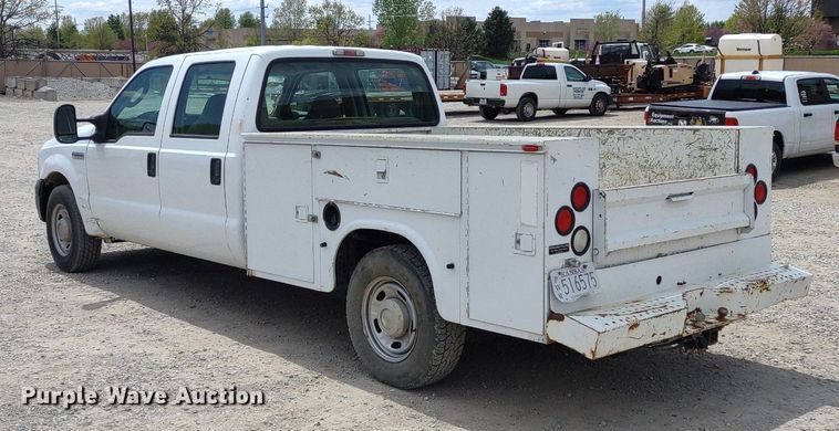 image for item LL9088 2006 Ford F350 Super Duty XL  Crew Cab utility bed pickup truck