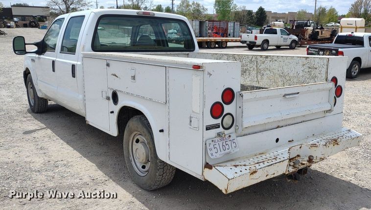 image for item LL9088 2006 Ford F350 Super Duty XL  Crew Cab utility bed pickup truck