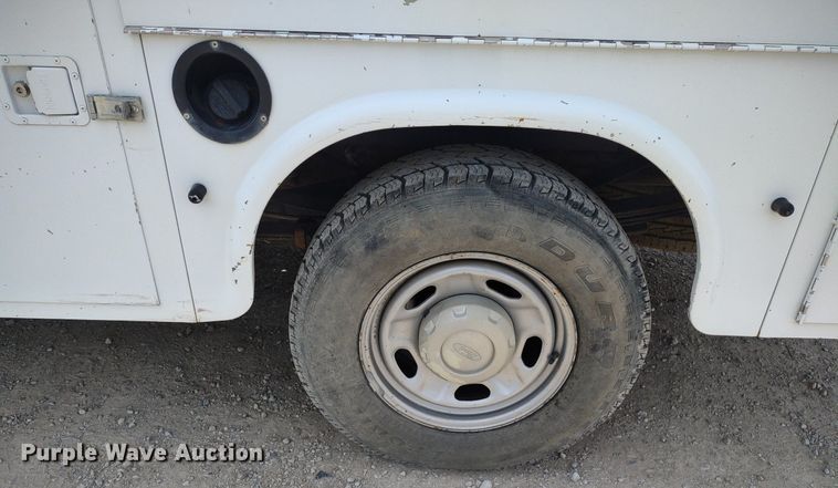 image for item LL9088 2006 Ford F350 Super Duty XL  Crew Cab utility bed pickup truck