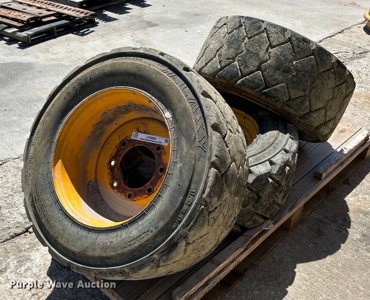 image for item LP9888 (3) 12-16.5 tires and wheels