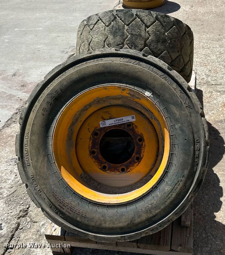 image for item LP9888 (3) 12-16.5 tires and wheels