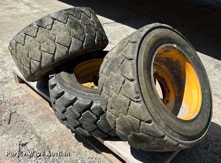 image for item LP9888 (3) 12-16.5 tires and wheels