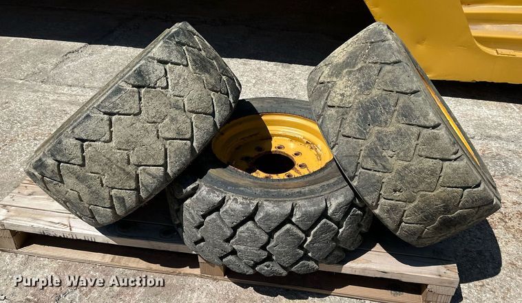 image for item LP9888 (3) 12-16.5 tires and wheels