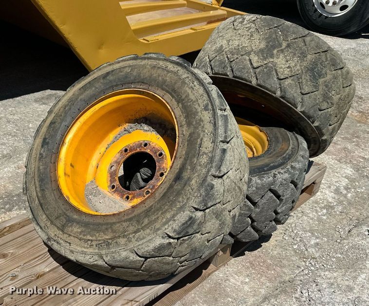 image for item LP9888 (3) 12-16.5 tires and wheels