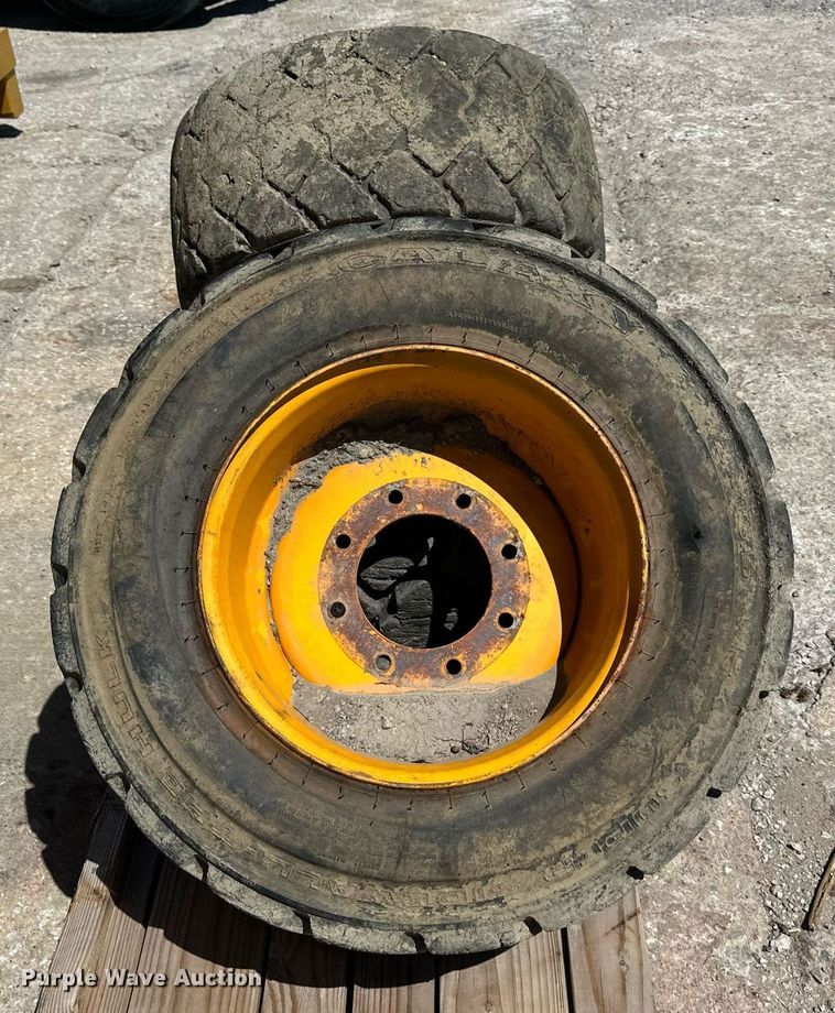 image for item LP9888 (3) 12-16.5 tires and wheels