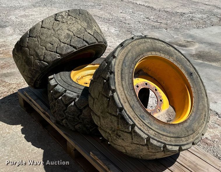 image for item LP9888 (3) 12-16.5 tires and wheels