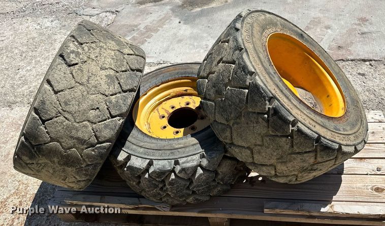 image for item LP9888 (3) 12-16.5 tires and wheels