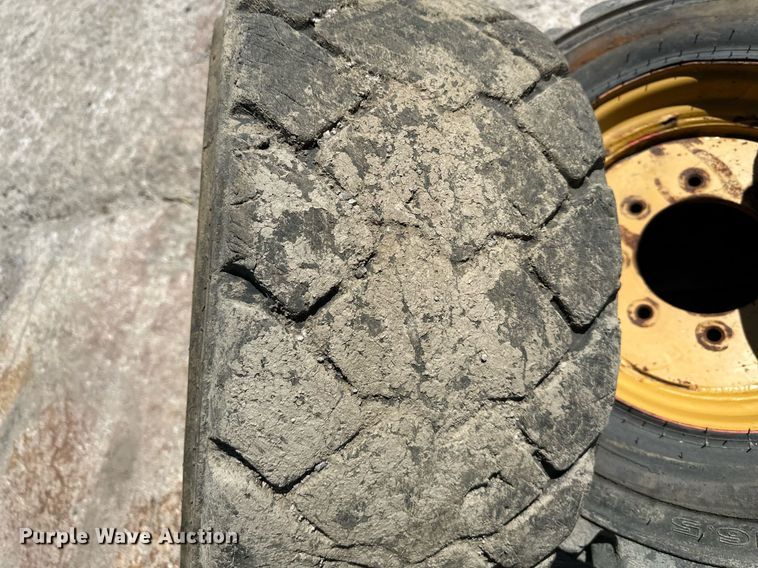 image for item LP9888 (3) 12-16.5 tires and wheels