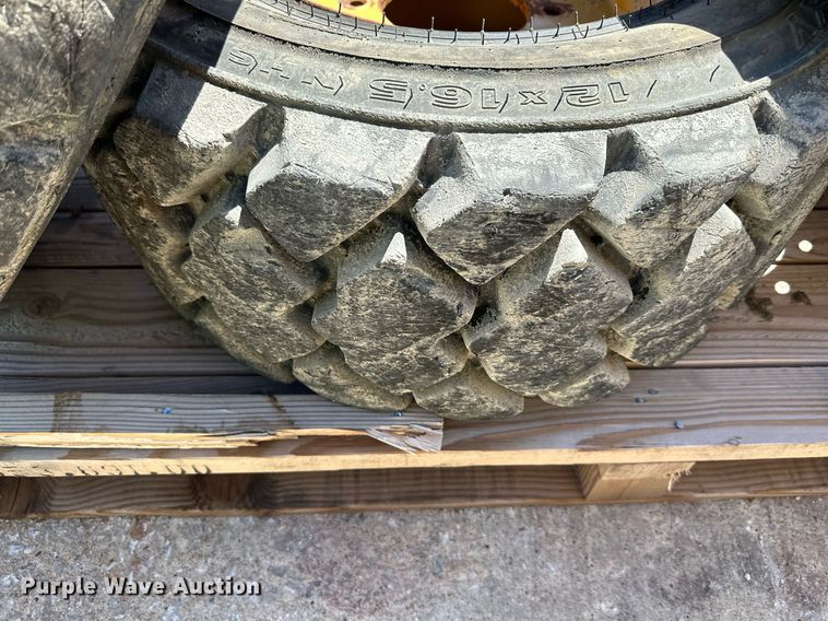 image for item LP9888 (3) 12-16.5 tires and wheels