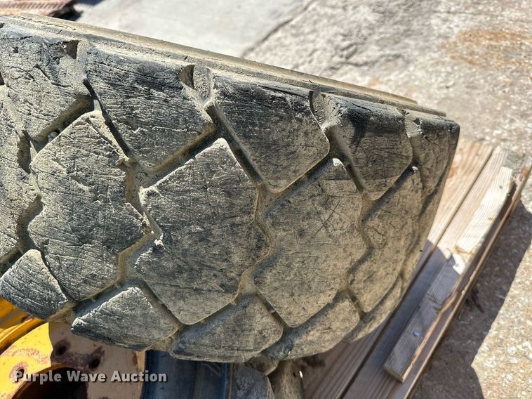 image for item LP9888 (3) 12-16.5 tires and wheels