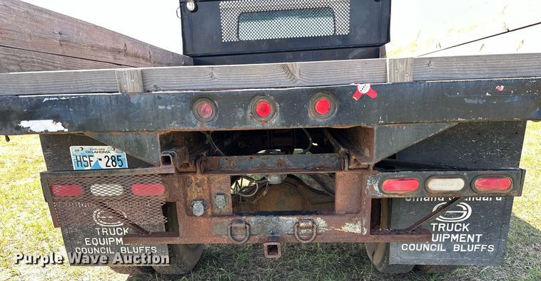 image for item LR9722 1999 International 4700  dump flatbed truck