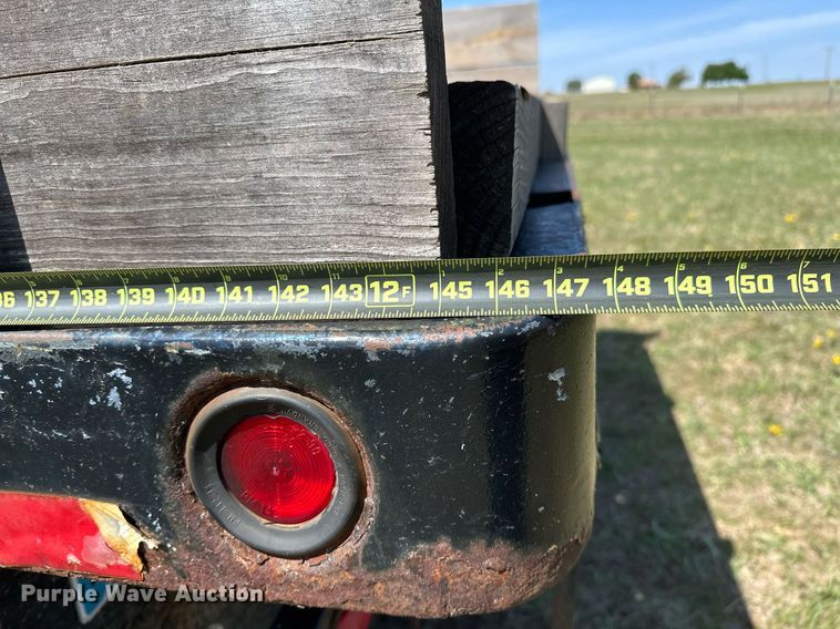 image for item LR9722 1999 International 4700  dump flatbed truck