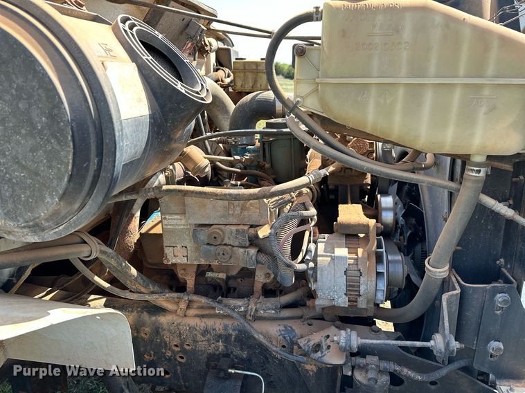 image for item LR9722 1999 International 4700  dump flatbed truck