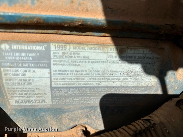 image for item LR9722 1999 International 4700  dump flatbed truck