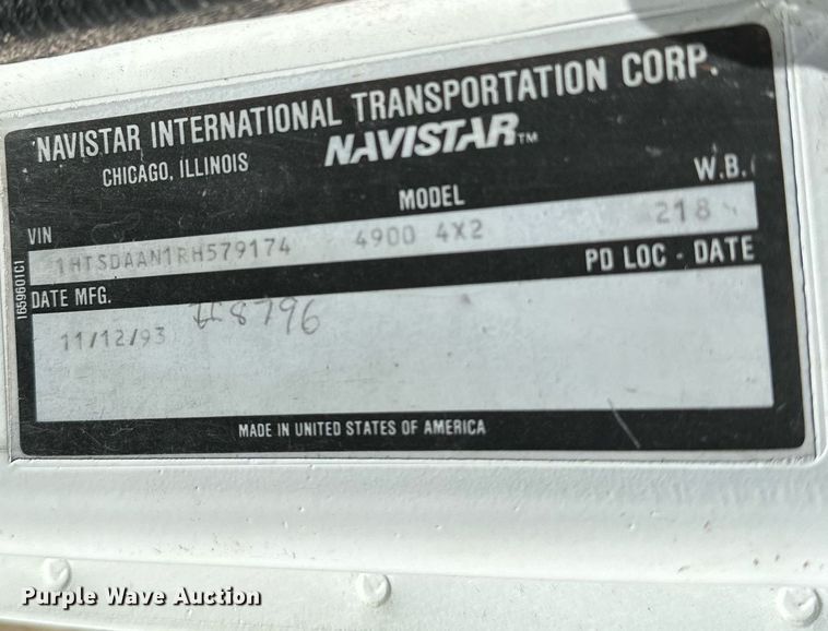 image for item LR9722 1999 International 4700  dump flatbed truck