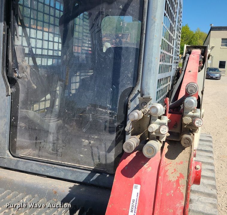image for item MX9740 2015 Takeuchi TL12  tracked skid steer loader