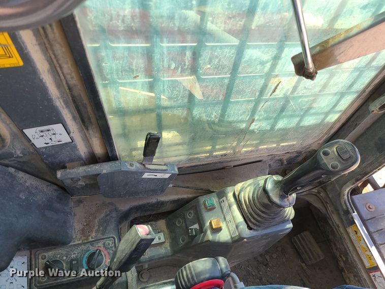 image for item MX9740 2015 Takeuchi TL12  tracked skid steer loader