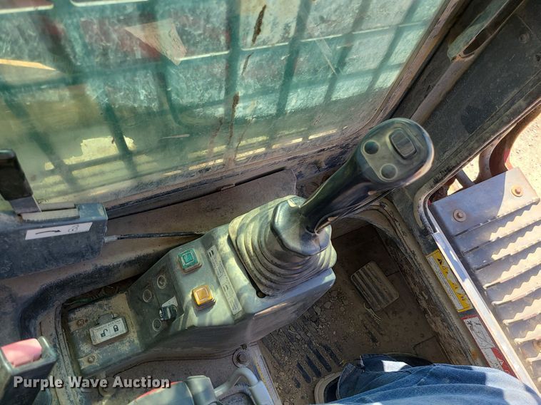 image for item MX9740 2015 Takeuchi TL12  tracked skid steer loader