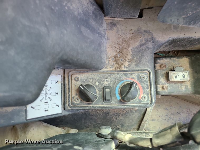 image for item MX9740 2015 Takeuchi TL12  tracked skid steer loader