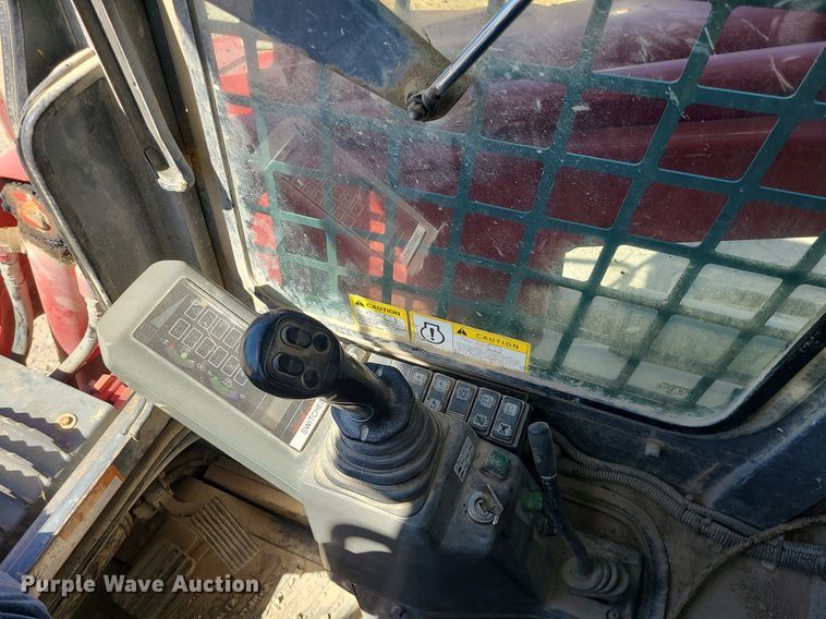 image for item MX9740 2015 Takeuchi TL12  tracked skid steer loader