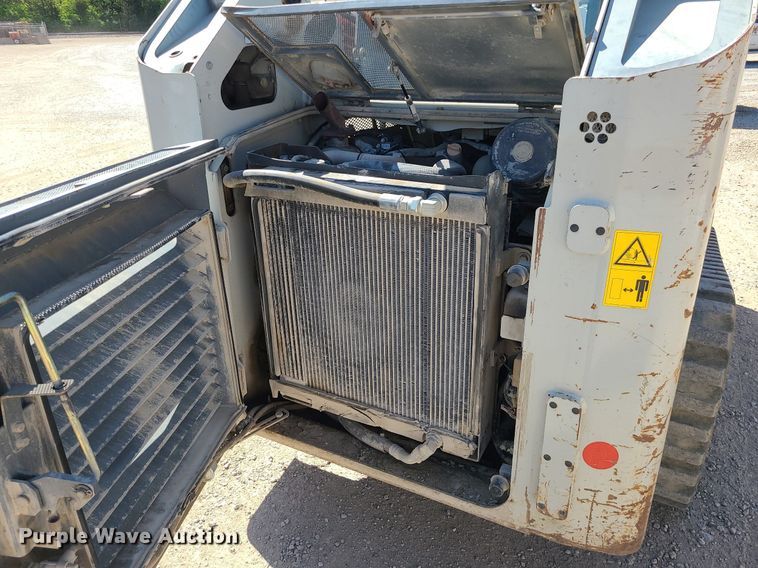 image for item MX9740 2015 Takeuchi TL12  tracked skid steer loader