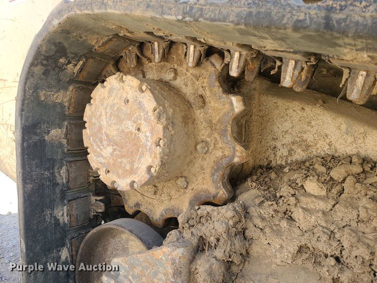 image for item MX9740 2015 Takeuchi TL12  tracked skid steer loader