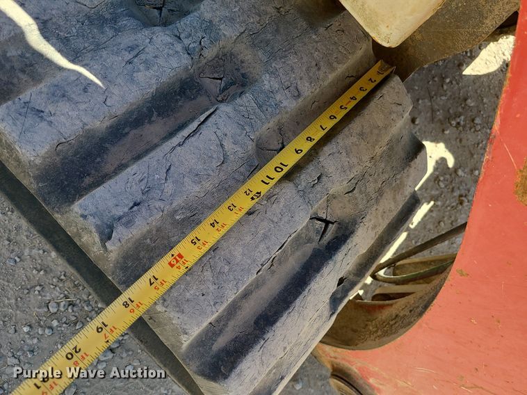 image for item MX9740 2015 Takeuchi TL12  tracked skid steer loader