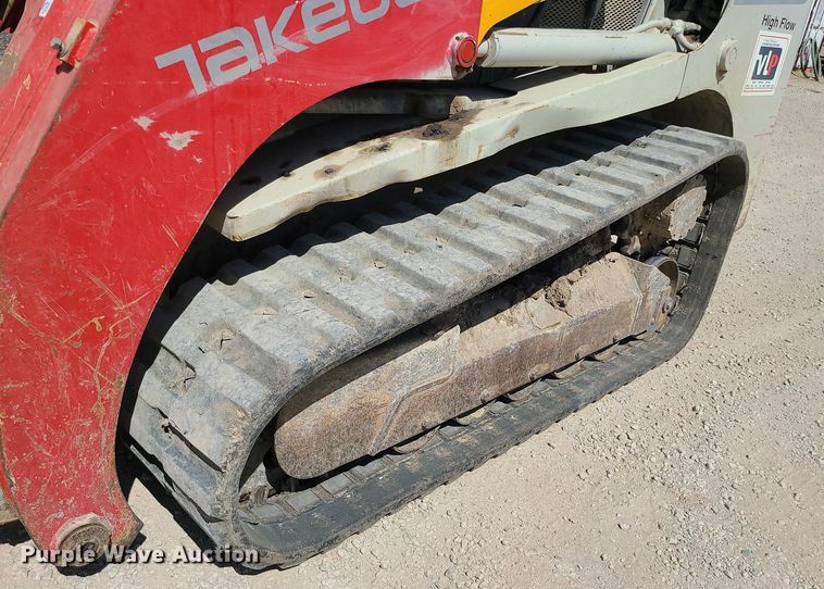 image for item MX9740 2015 Takeuchi TL12  tracked skid steer loader