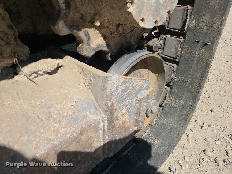 image for item MX9740 2015 Takeuchi TL12  tracked skid steer loader