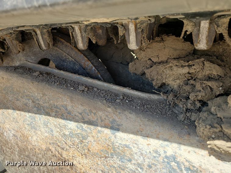 image for item MX9740 2015 Takeuchi TL12  tracked skid steer loader