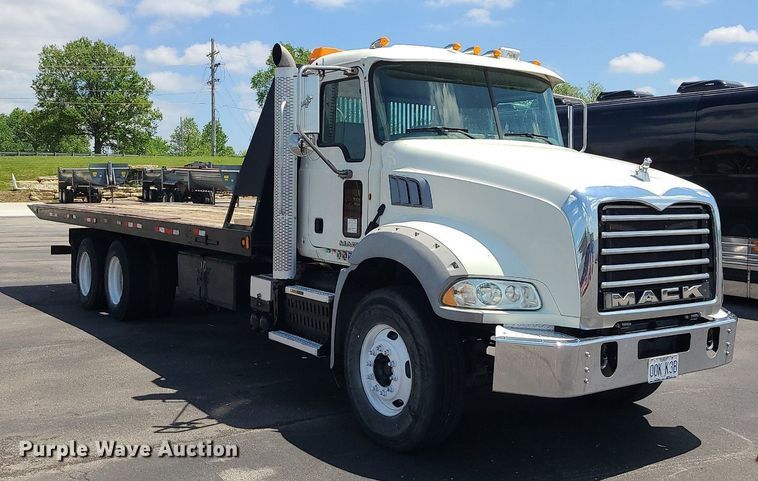 image for item MX9779 2013 Mack GU533  rollback truck