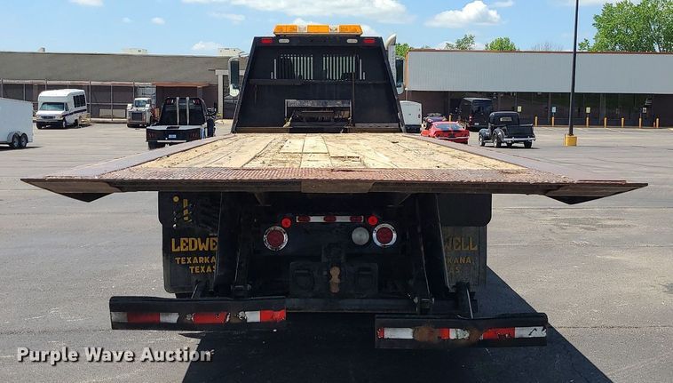 image for item MX9779 2013 Mack GU533  rollback truck