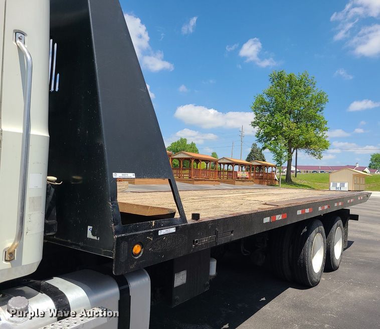 image for item MX9779 2013 Mack GU533  rollback truck