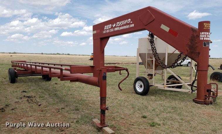 image for item DQ0551 Red Rhino  hay bale trailer
