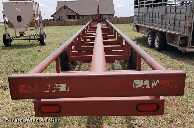image for item DQ0551 Red Rhino  hay bale trailer