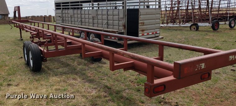 image for item DQ0551 Red Rhino  hay bale trailer