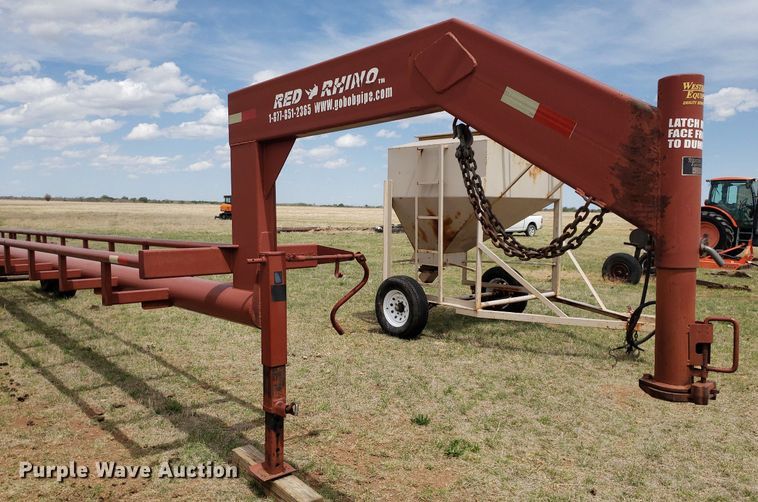 image for item DQ0551 Red Rhino  hay bale trailer