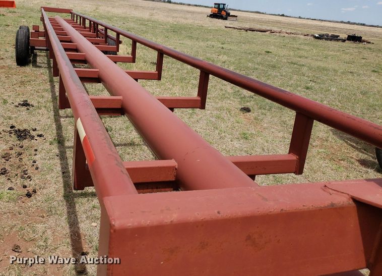 image for item DQ0551 Red Rhino  hay bale trailer