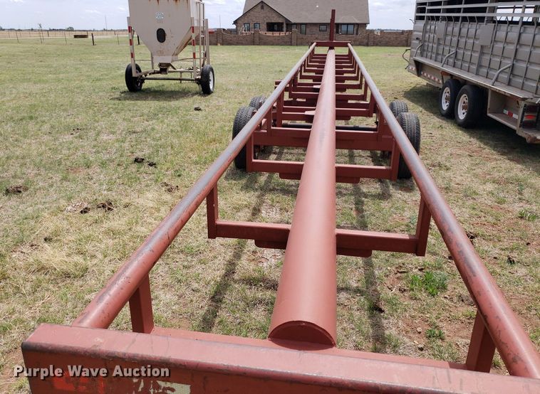 image for item DQ0551 Red Rhino  hay bale trailer