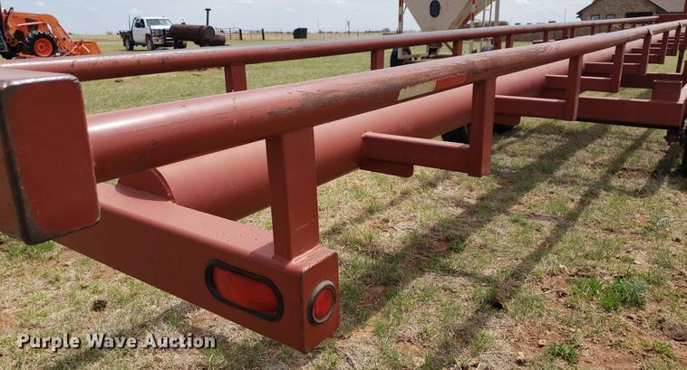 image for item DQ0551 Red Rhino  hay bale trailer