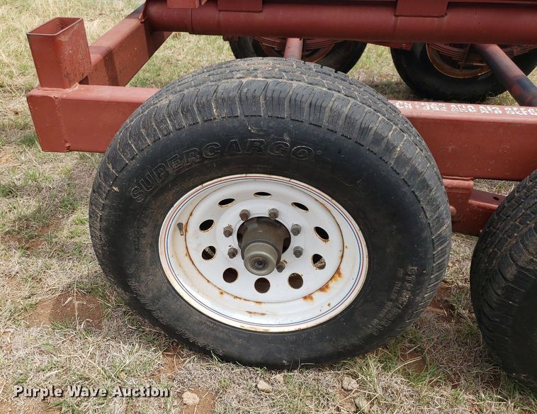 image for item DQ0551 Red Rhino  hay bale trailer
