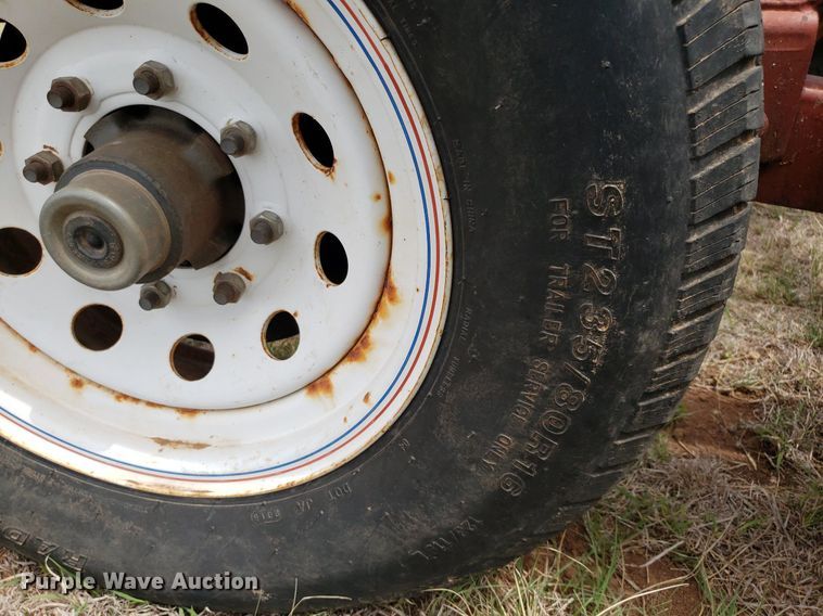 image for item DQ0551 Red Rhino  hay bale trailer