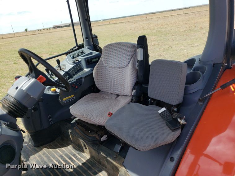 image for item DQ0557 Kubota M135GX  MFWD tractor