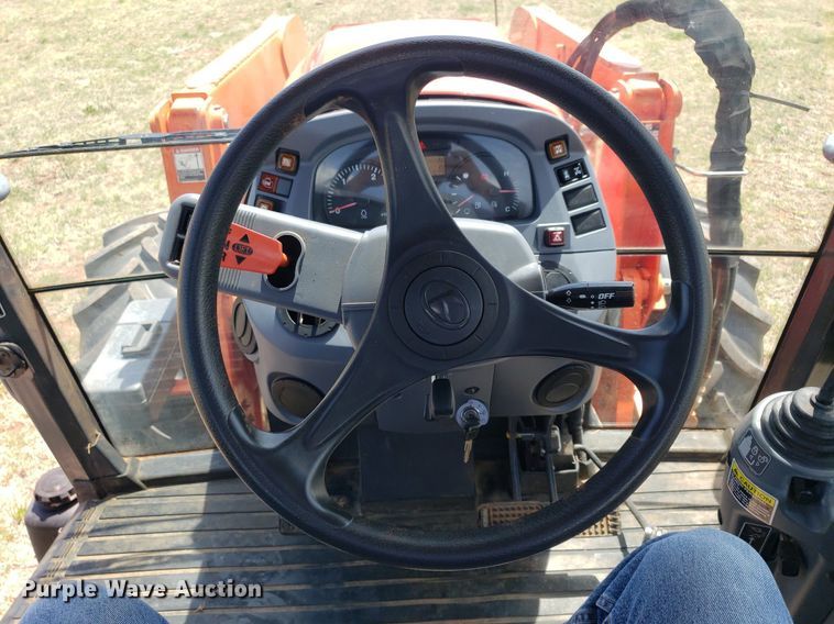 image for item DQ0557 Kubota M135GX  MFWD tractor