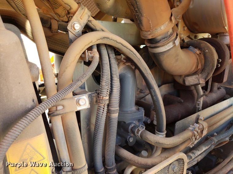 image for item DQ0557 Kubota M135GX  MFWD tractor